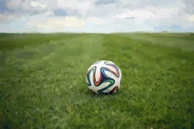 soccer-ball-in-wide-green-field