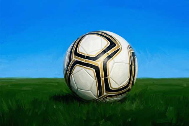 soccer-ball-on-grass-blue-sky