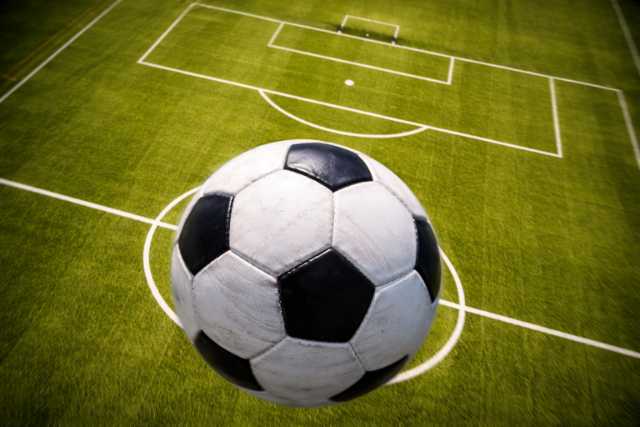 soccer-ball-on-soccer-field-top-view