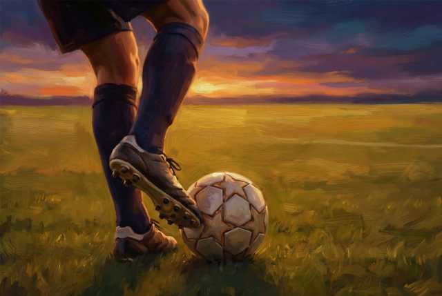 soccer-player-with-ball-at-sunset